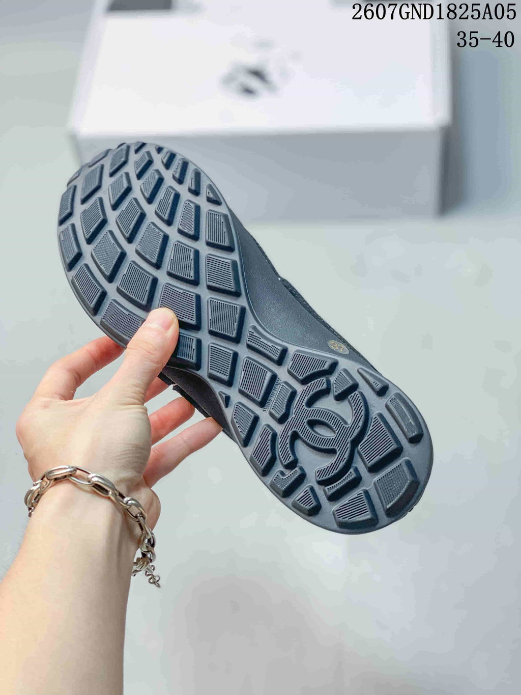 Chanel Low-Top Sneakers in Black and White 2607GND1825A05 - product image from the listing.