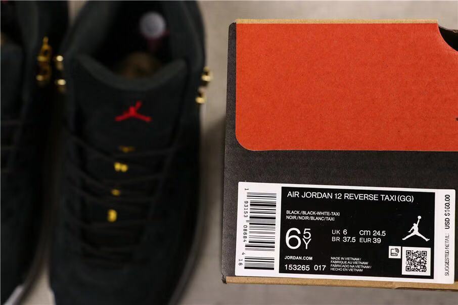 Air Jordan 12 Reverse Taxi Sneakers Black 153265-017 - product image from the listing.