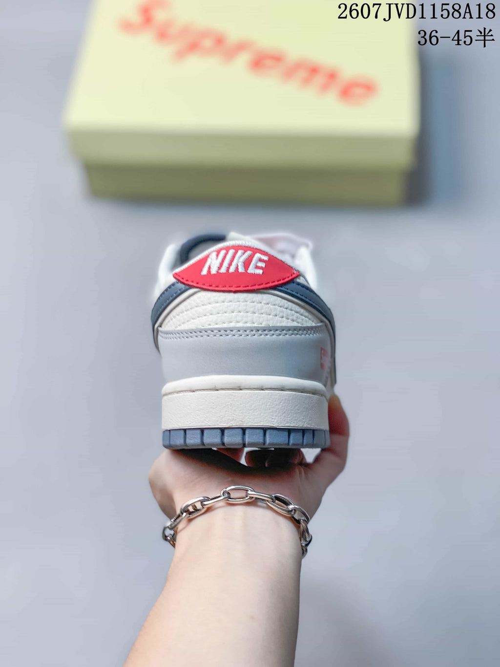Nike SB Dunk Low Sneakers in Gray White Black - product image from the listing.