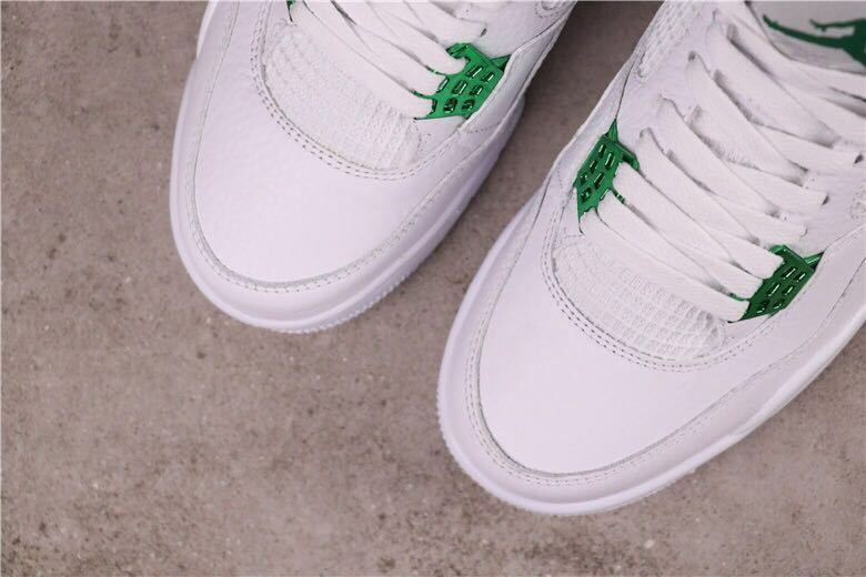 Pine Green Sneakers White/Green - Nike Air Jordan 4 CT8527-113 - product image from the listing.
