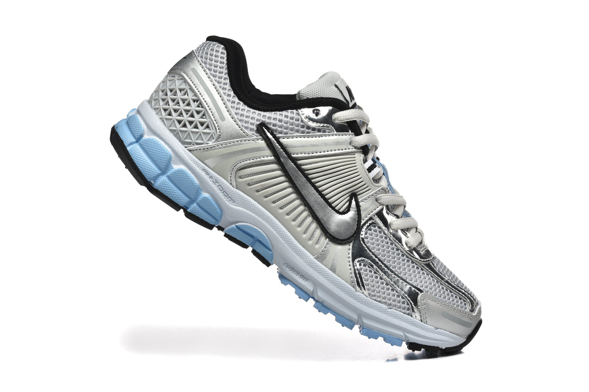 Nike Vomero 5 Sneakers in Silver and Light Blue - product image from the listing.