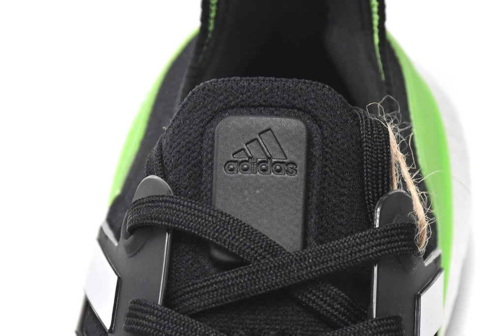 adidas UltraBoost 22 Black Solar Running Shoes in Green GX6640 - product image from the listing.