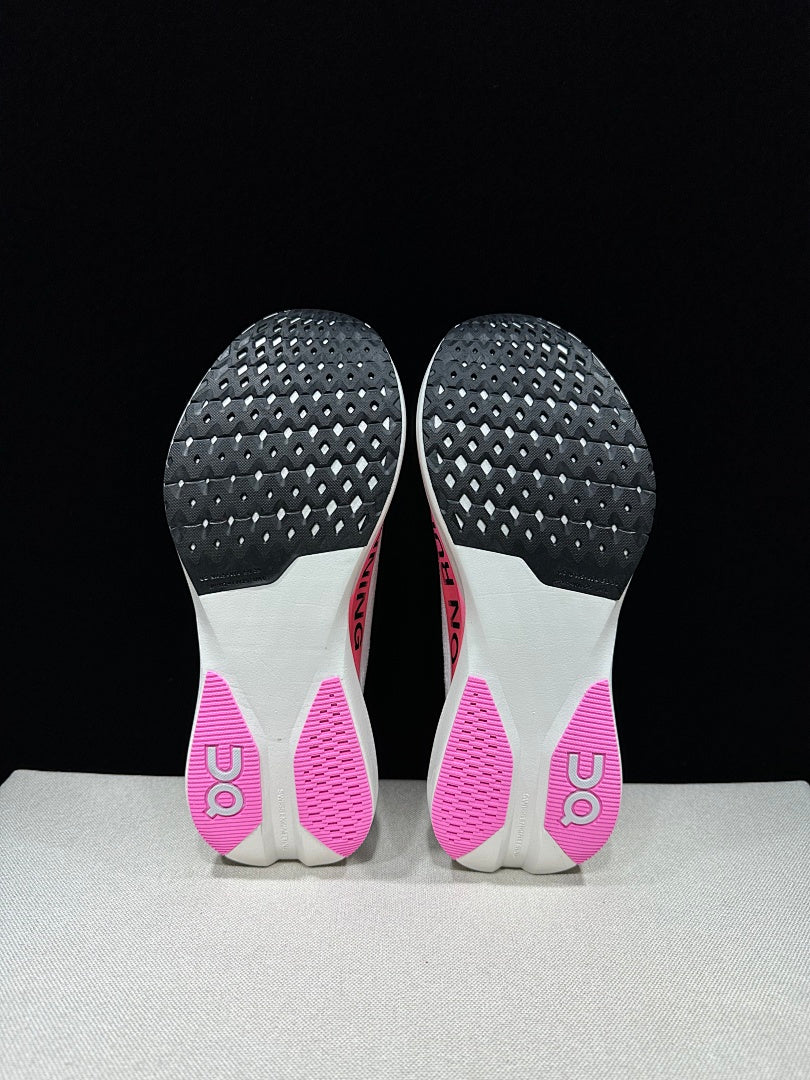 Pink and White On Cloudboom Strike LS Running Shoes - product image from the listing.