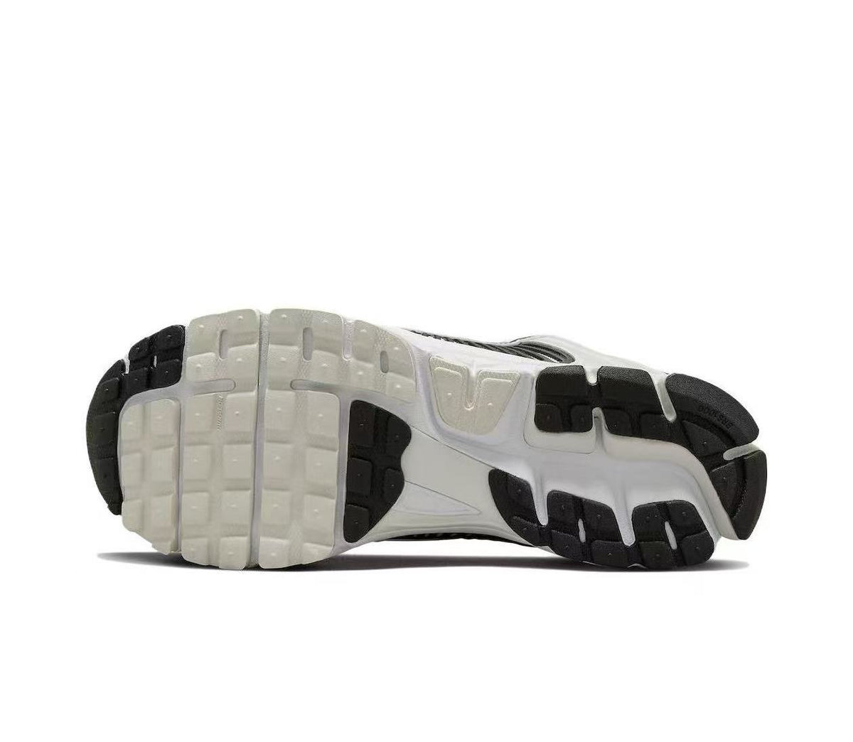 Nike Zoom Vomero 5 Sneakers in White and Black - product image from the listing.