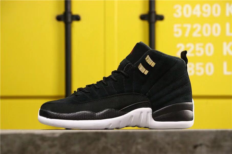 Air Jordan 12 Reverse Taxi Sneakers Black 153265-017 - product image from the listing.