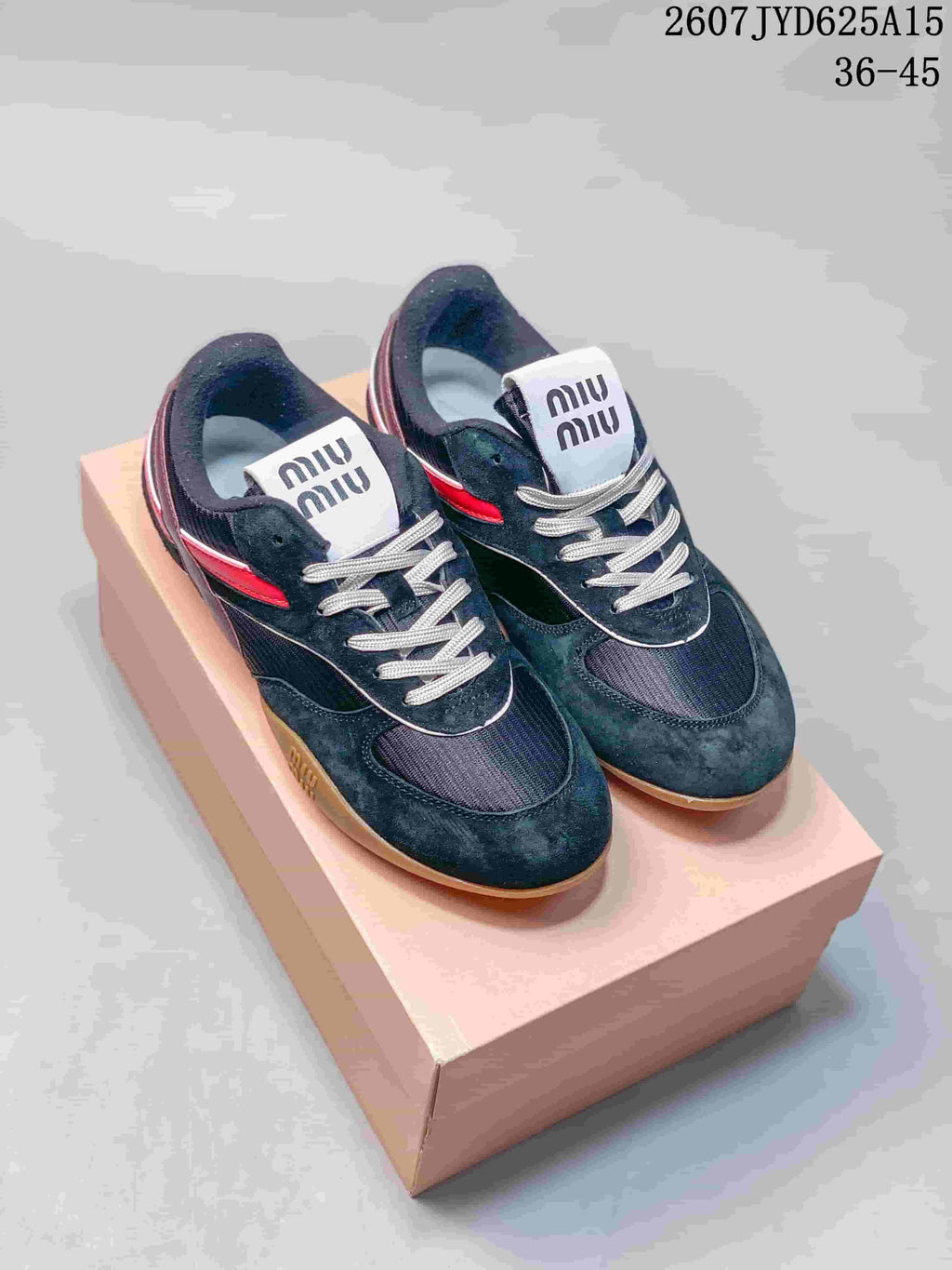 Miu Miu Gymnasium Low-Top Sneakers in Black Red 2607JYD625A15 - product image from the listing.