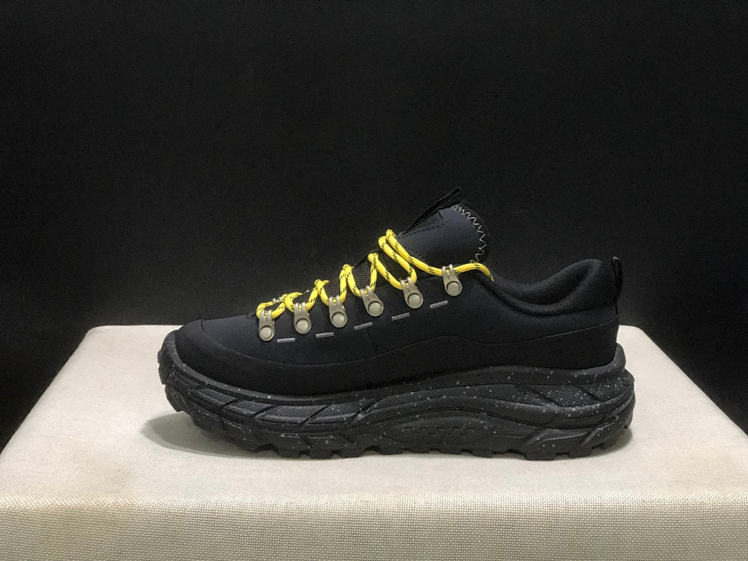 HOKA Tor Summit Trail Sneakers in Black and Yellow - product image from the listing.