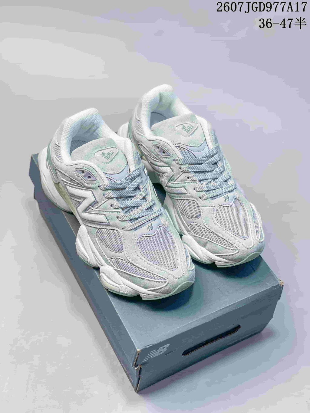 New Balance 9060 Sneakers in Mint Green and White - product image from the listing.