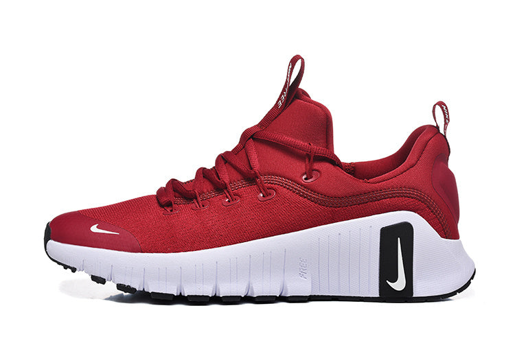 Nike Free Low-Top Sneakers in Red - product image from the listing.