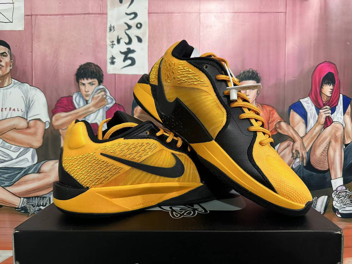 Nike Basketball Shoes in Black and Yellow - product image from the listing.