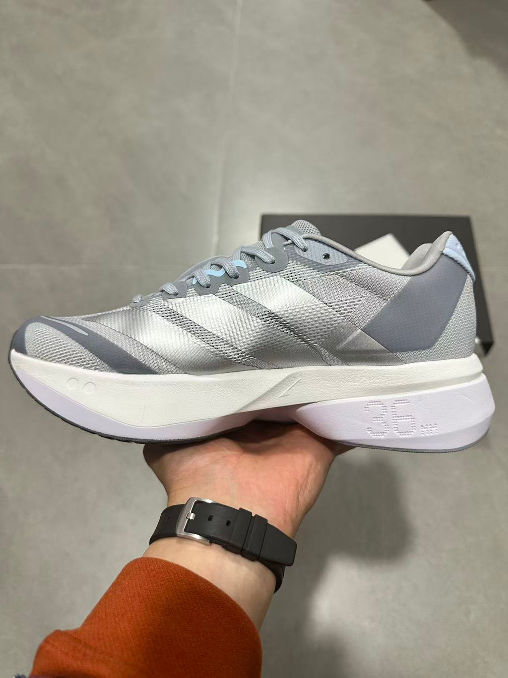 Nike ZoomX Invincible Run 4 Road Running Shoes in Grey - product image from the listing.