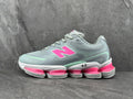 Gray and Pink New Balance Running Sneakers - product image from the listing.