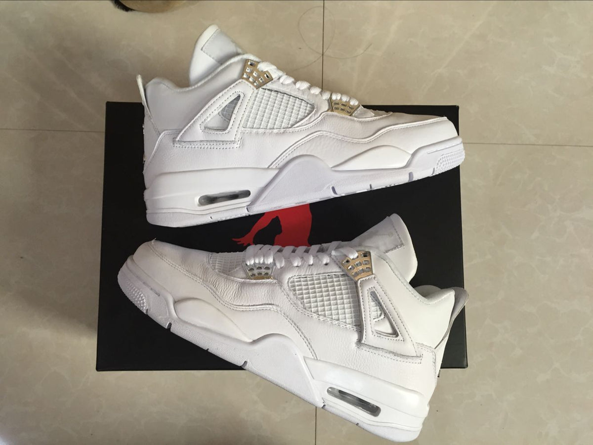 Air Jordan 4 Retro White High-Top Sneakers - product image from the listing.