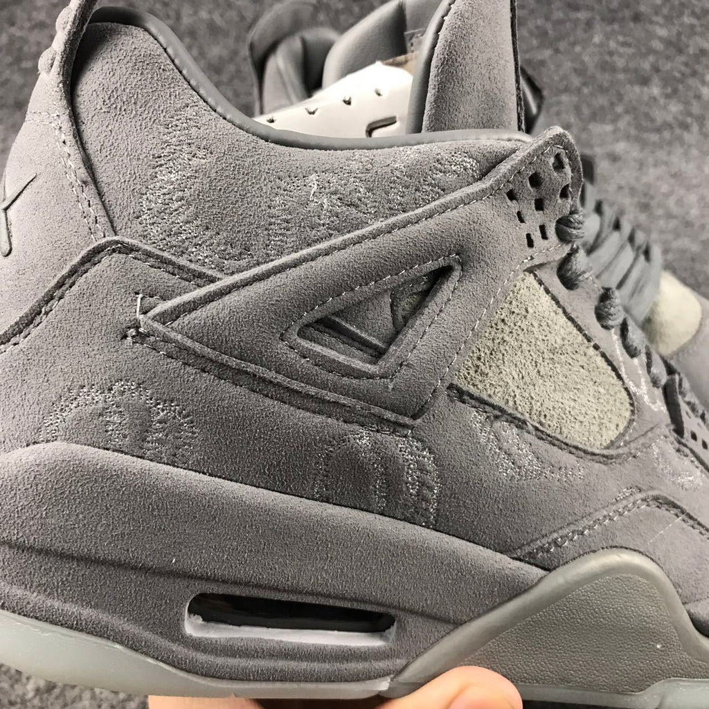 Grey Jordan 4 KAWS Sample High-Top Sneakers - product image from the listing.