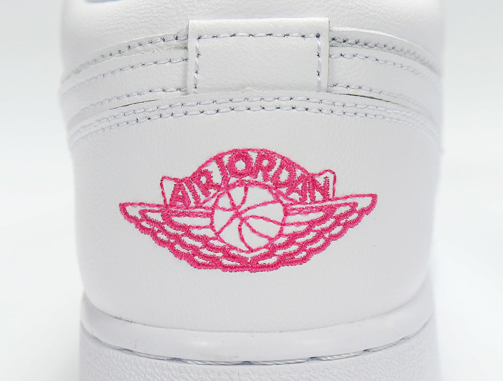 Air Jordan 1 Low White and Pink Sneakers - product image from the listing.