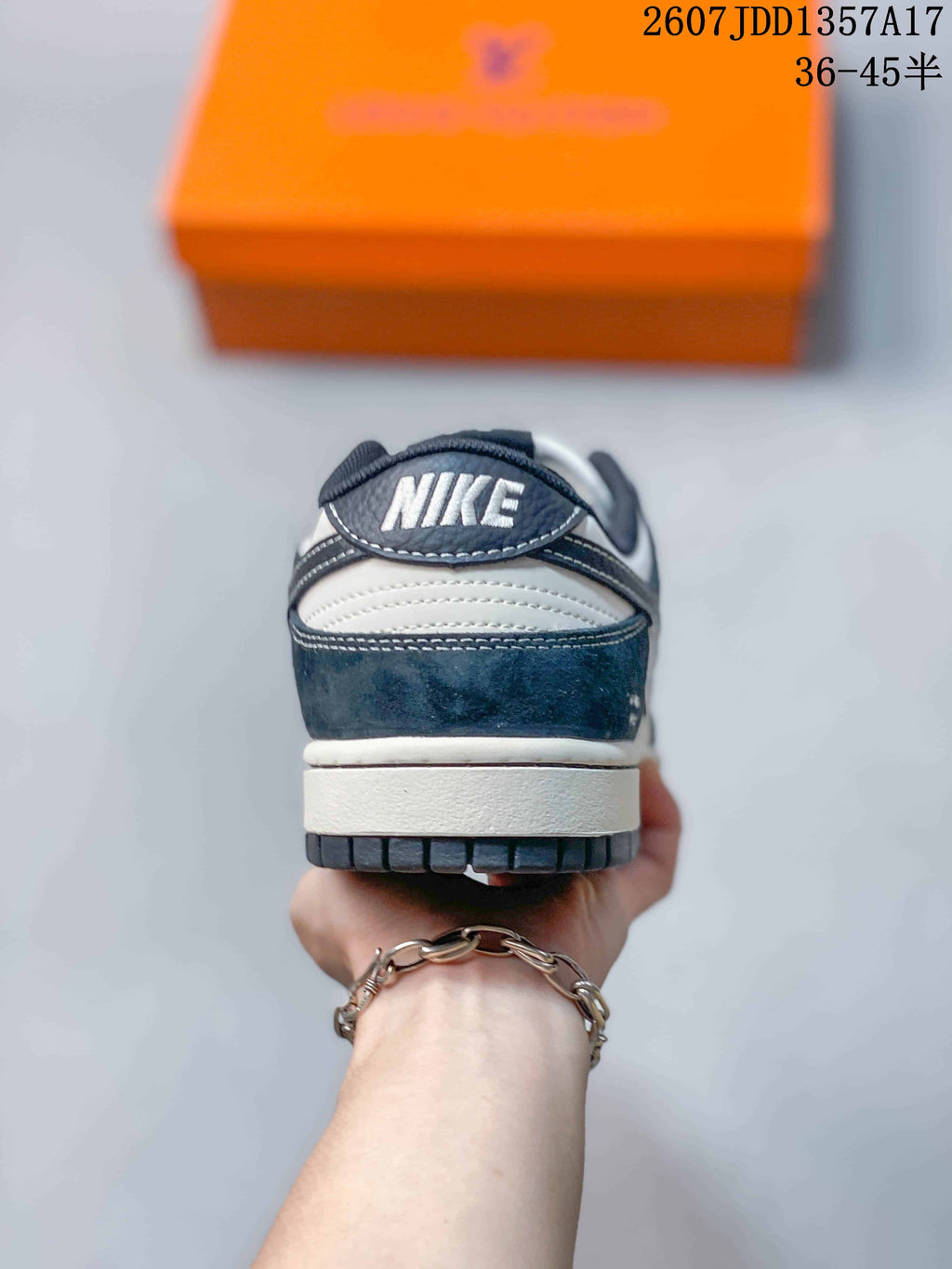 Nike SB Dunk Low Sneakers in Navy and White 2607JDD1357A17 - product image from the listing.