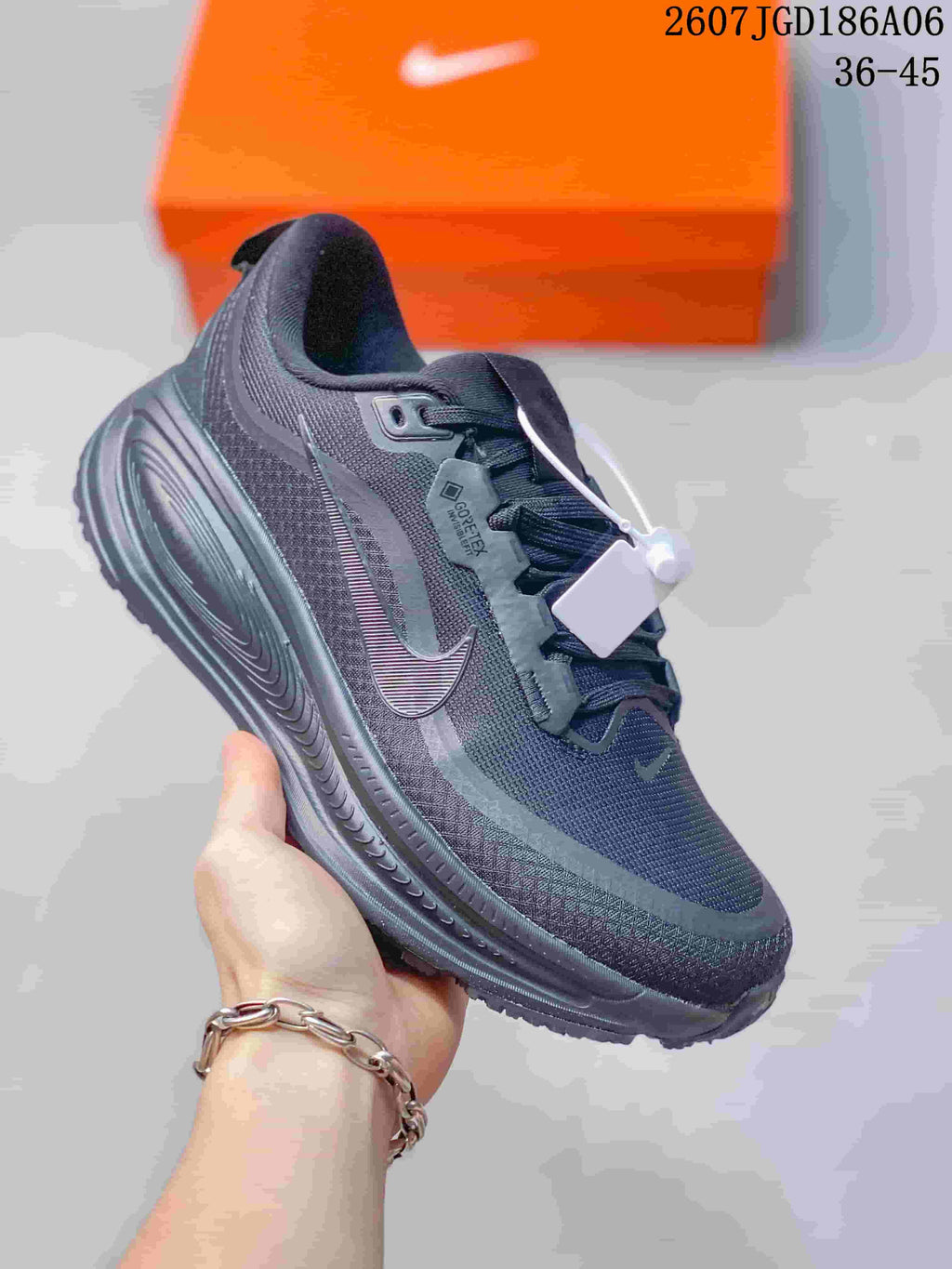 Nike Vomero Plus Running Shoes in Black 2607TGD186A06 - product image from the listing.