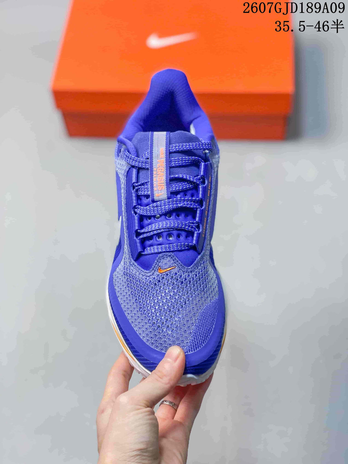 Nike Vomero Premium Running Shoes in Blue - product image from the listing.