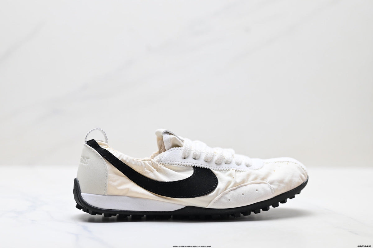 Jacquemus x Nike Jacumoon Low-Top Sneakers, in White and Black - product image from the listing.