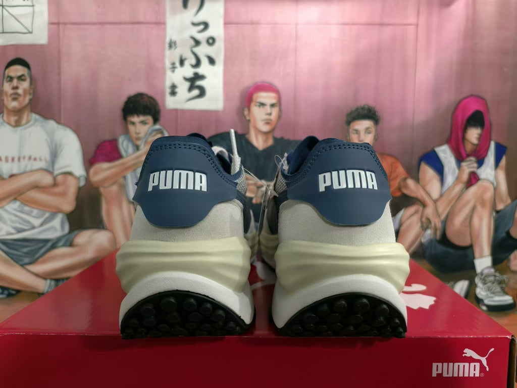 White and Navy PUMA Rider Elite Sneakers - product image from the listing.