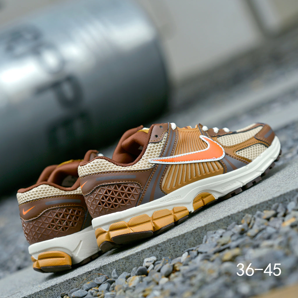 Brown and Orange Nike Air Zoom Vomero 5 Sneakers - product image from the listing.