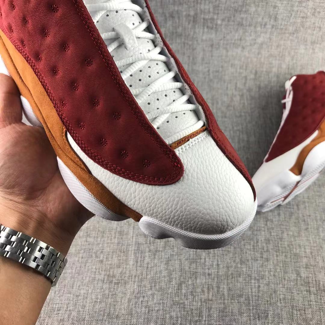 Air Jordan 13 Bin 23 Sneakers Burgundy Brown 417212-601 - product image from the listing.
