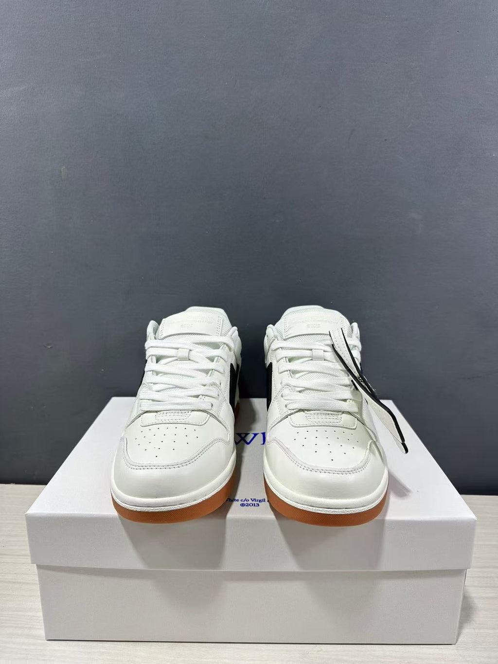 Off-White Out Of Office Sneakers in White Black OMIA189C99LEA0110110 - product image from the listing.
