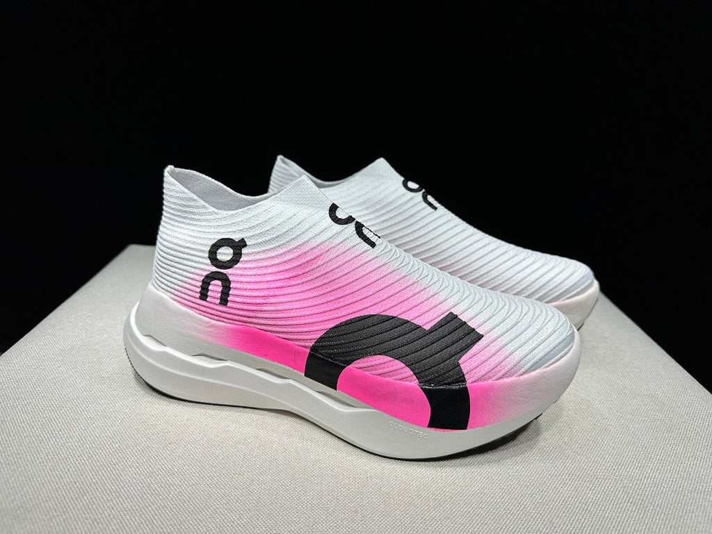 On Cloudboom Strike LS Running Sneakers in White/Pink - product image from the listing.
