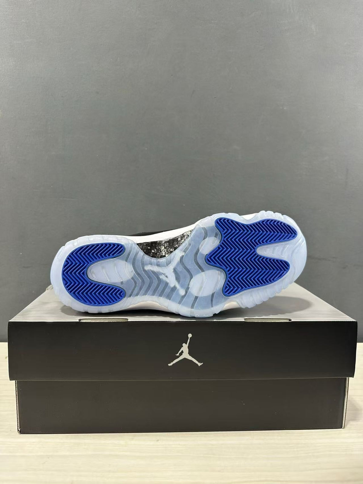 Air Jordan 11 Retro High Black Blue Sneakers CT8012-900 - product image from the listing.