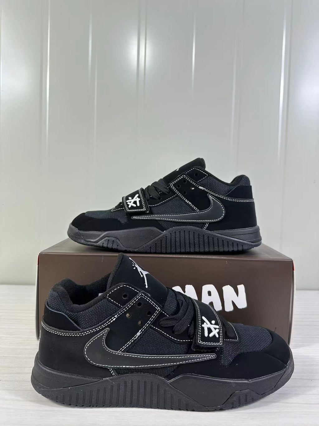 Jordan Cut the Check Sneakers in Black FZ8117-204 - product image from the listing.