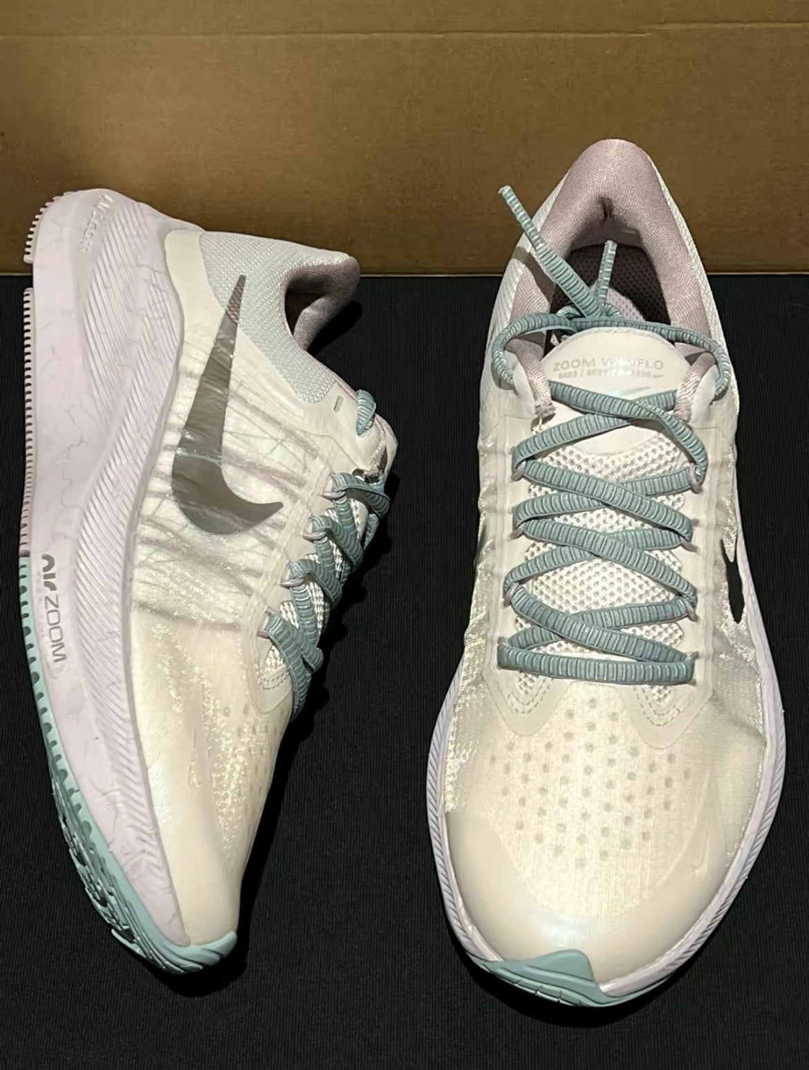 Nike Zoom Winflo 8 Running Shoes in White Silver DA3056-002 - product image from the listing.