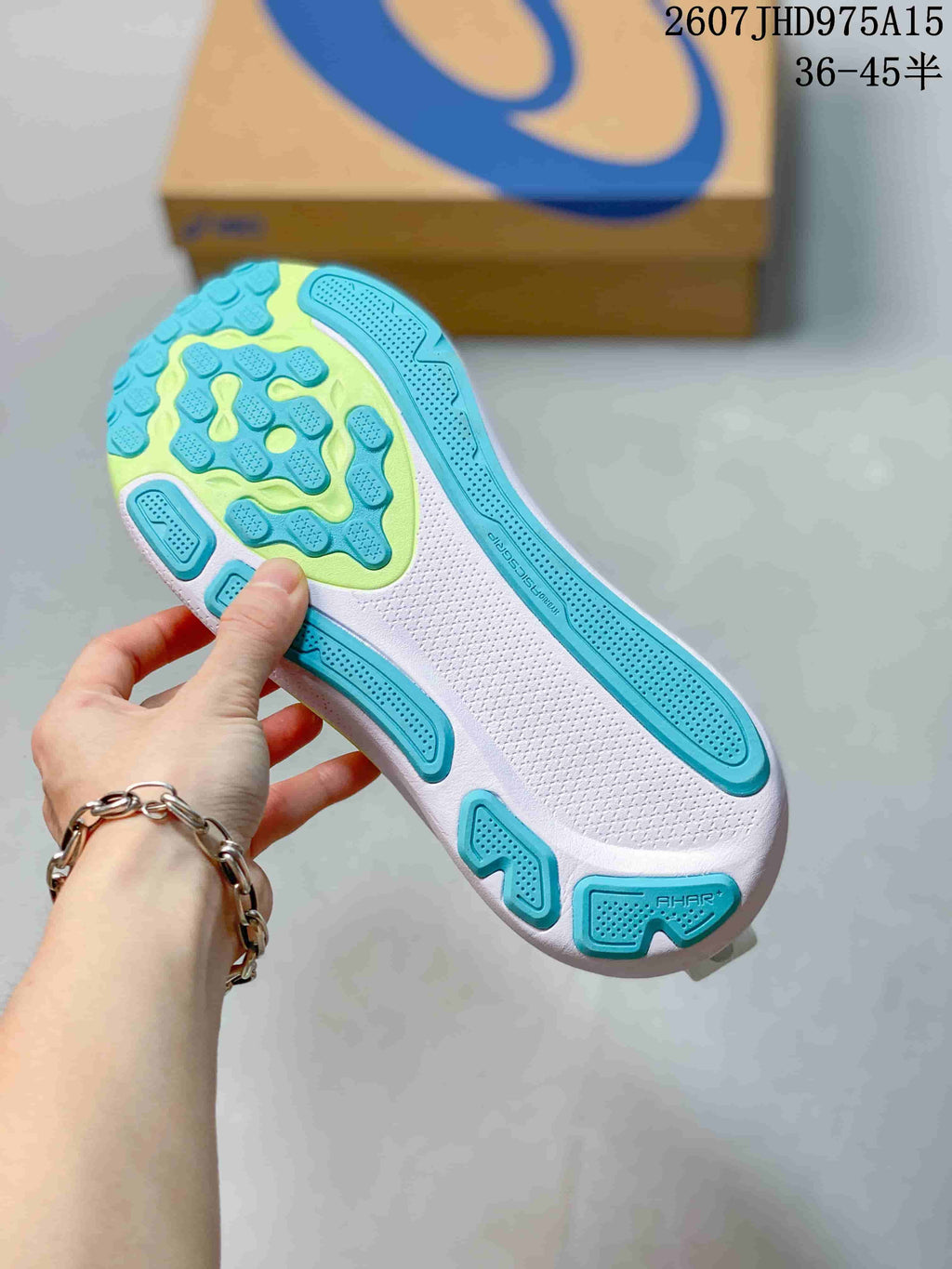 ASICS Gel-Kayano 33 Running Shoes in White Lime Blue 1011C167-402 - product image from the listing.