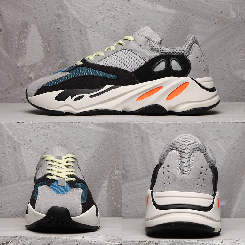 Men's Adidas 700 Sneakers in Gray, Black and Orange - product image from the listing.