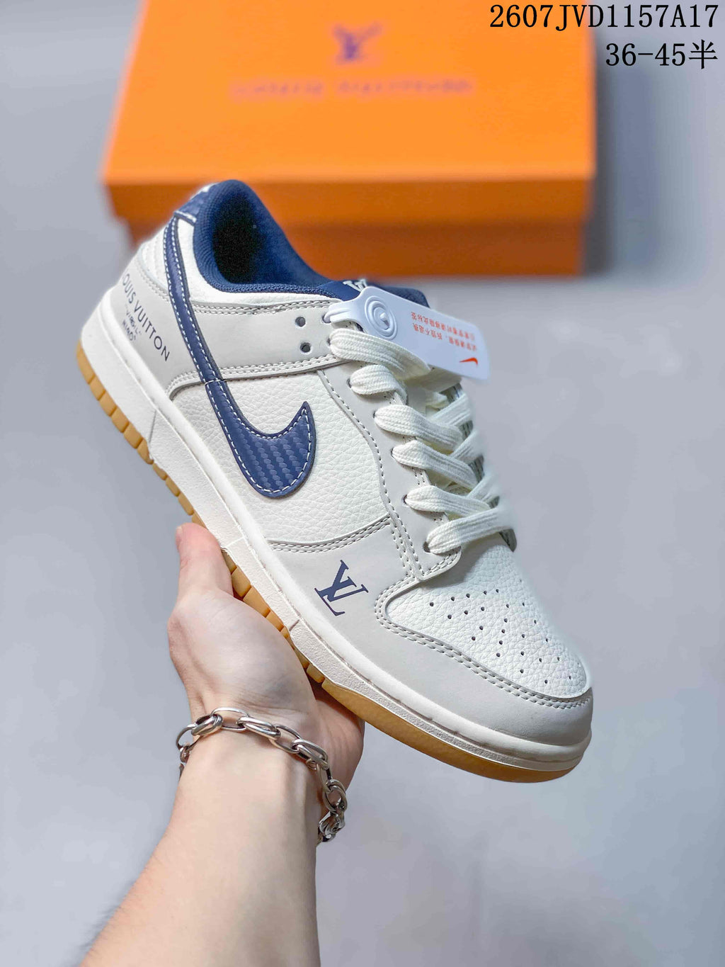 Louis Vuitton x Nike Dunk Low Sneakers in White Navy - product image from the listing.