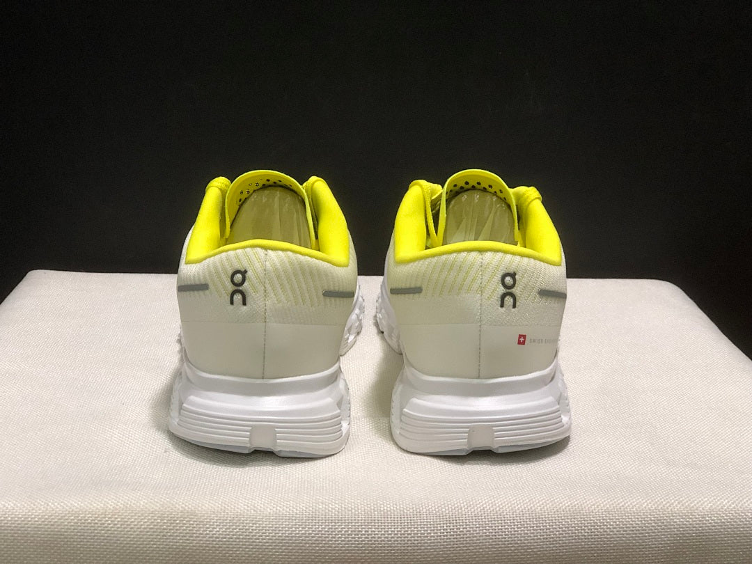 On Cloud 6 Push Sneakers in White and Yellow - product image from the listing.