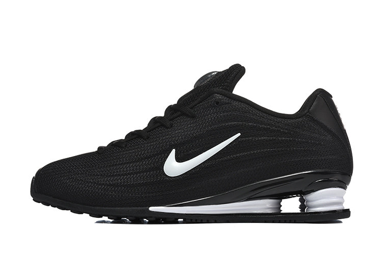 Nike Low-Top Sneakers in Black and White - product image from the listing.