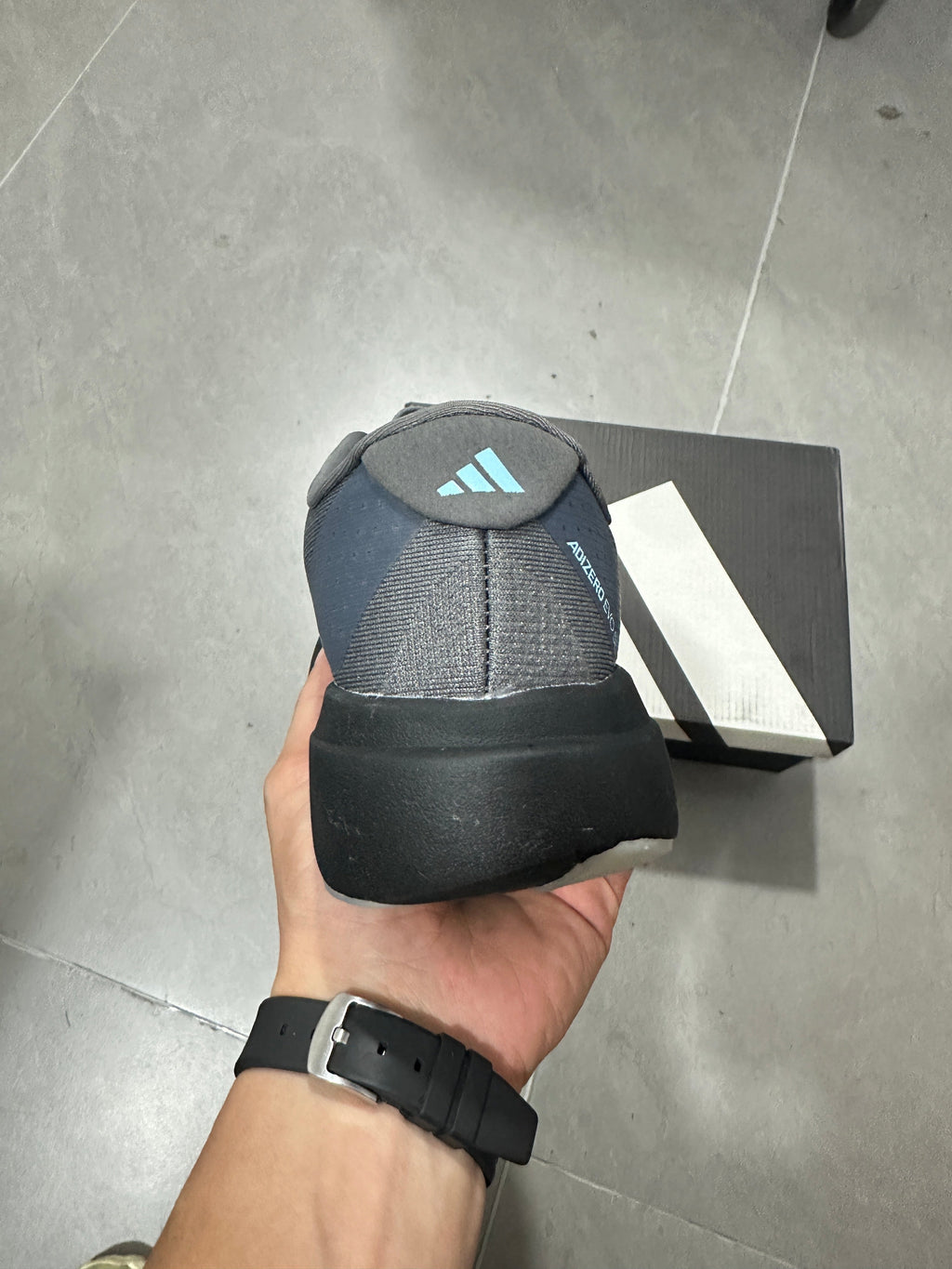 Grey and Blue Adizero Lightstrike Pro Running Shoes - product image from the listing.