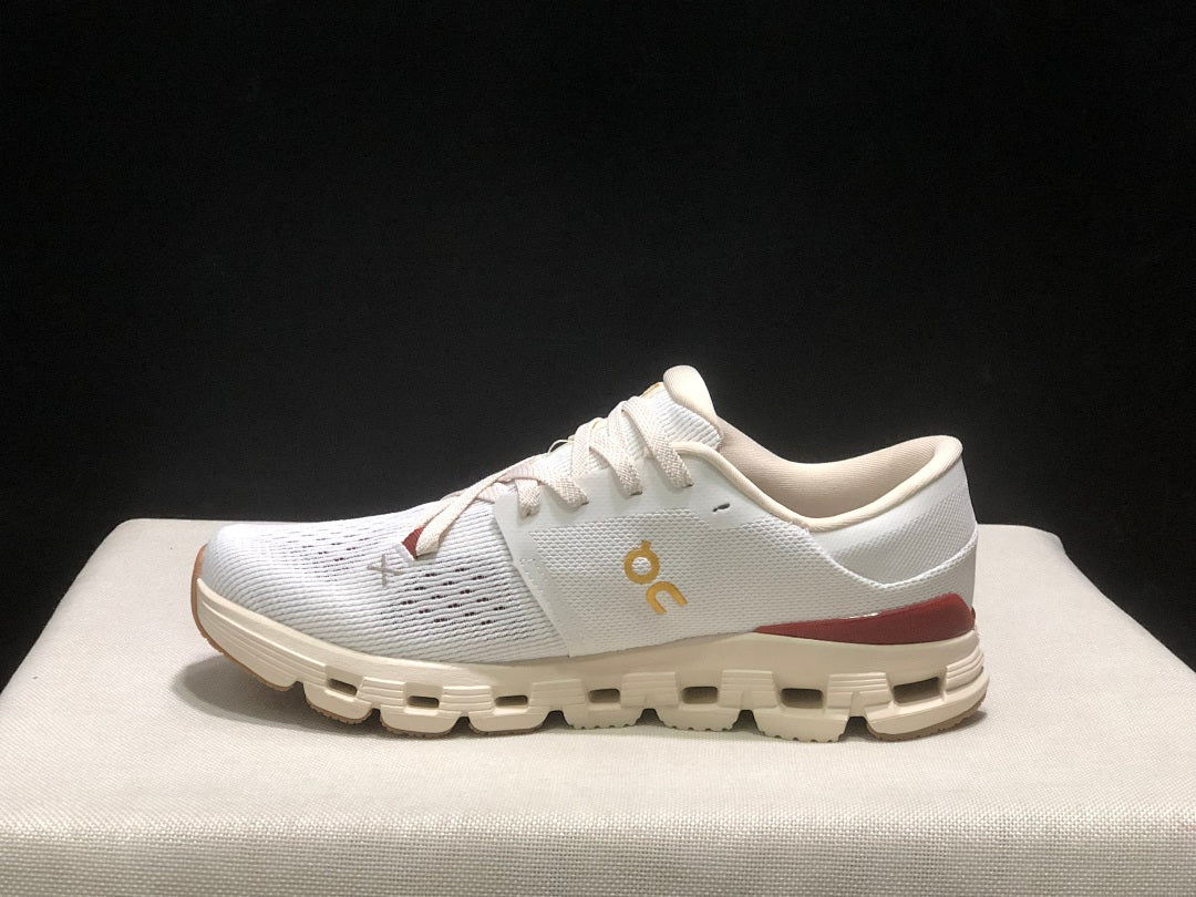 On Cloud X 4 Year of the Snake Sneakers in Ivory Cream - product image from the listing.