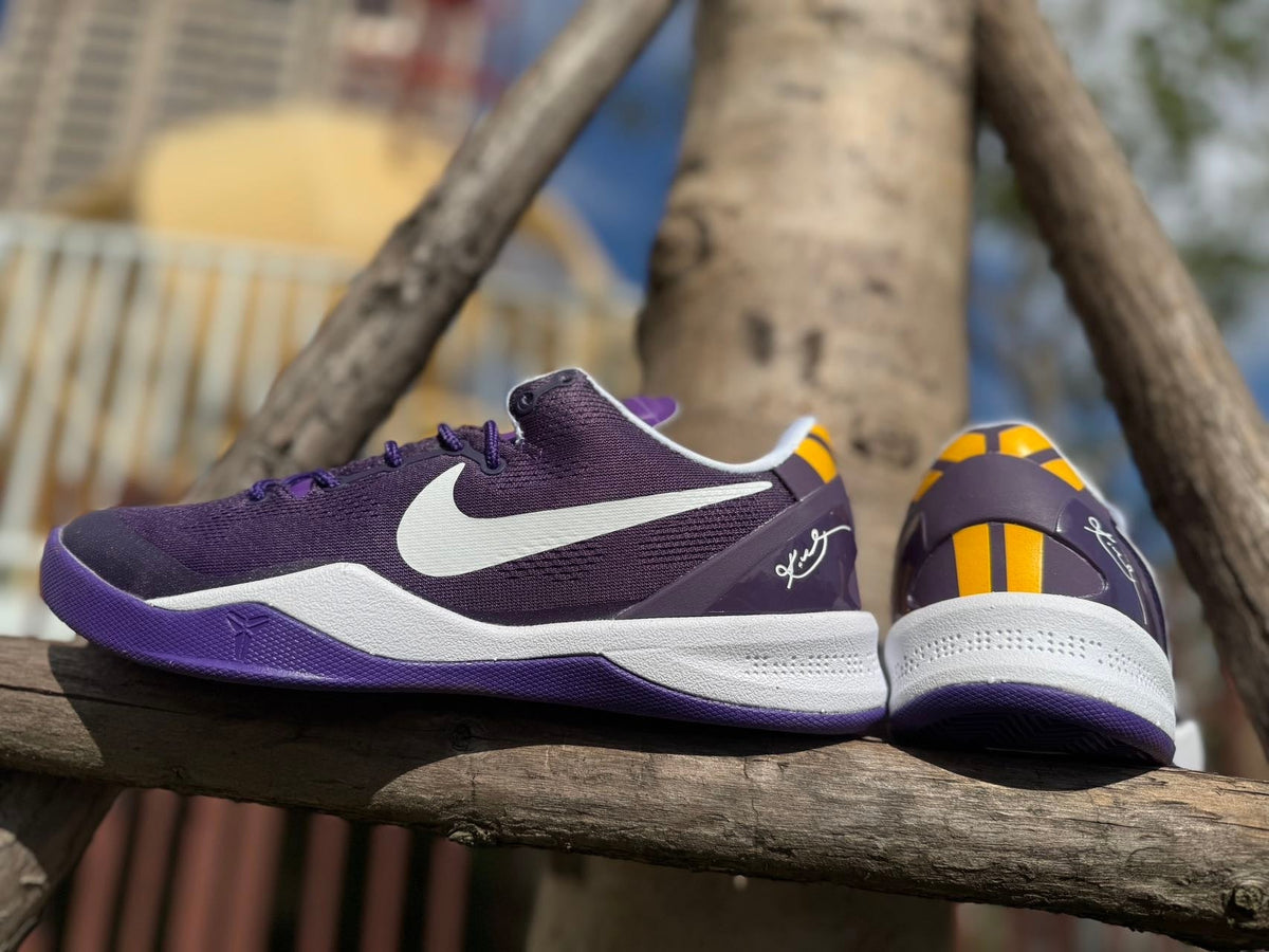 Nike Kobe 8 LSU Away Basketball Shoes, in Purple and Gold - product image from the listing.