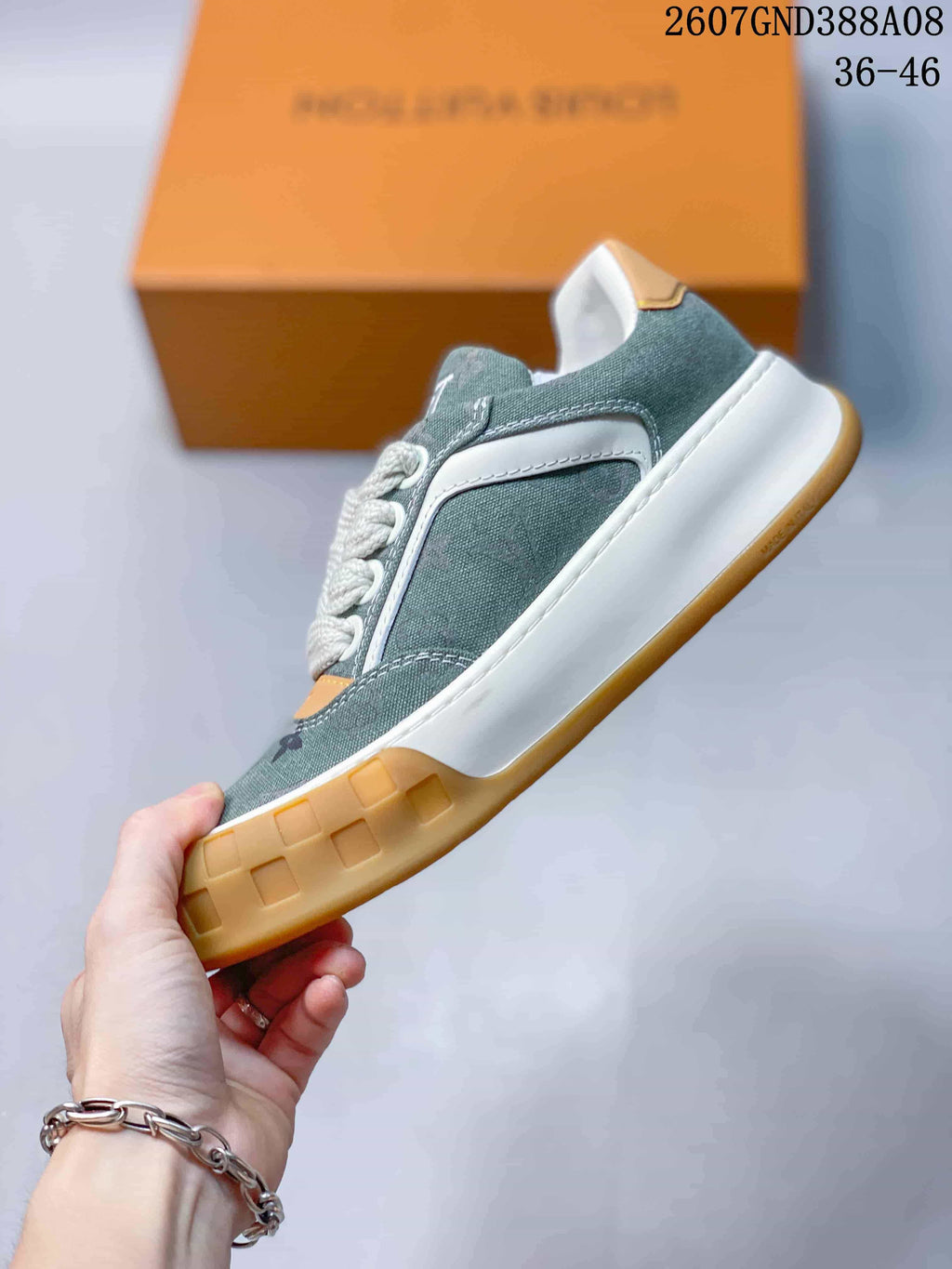 Louis Vuitton Tilted Low-Cut Sneakers in Green Monogram - product image from the listing.