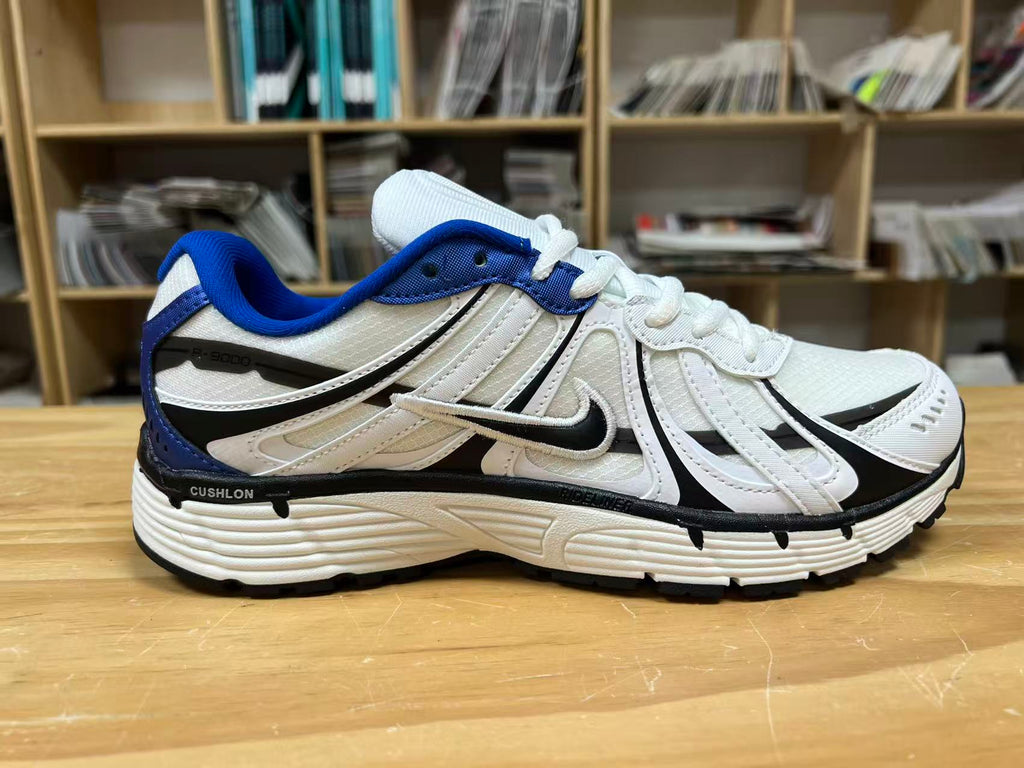 Nike P-6000 Sneakers in White Blue Black IZ4752-100 - product image from the listing.