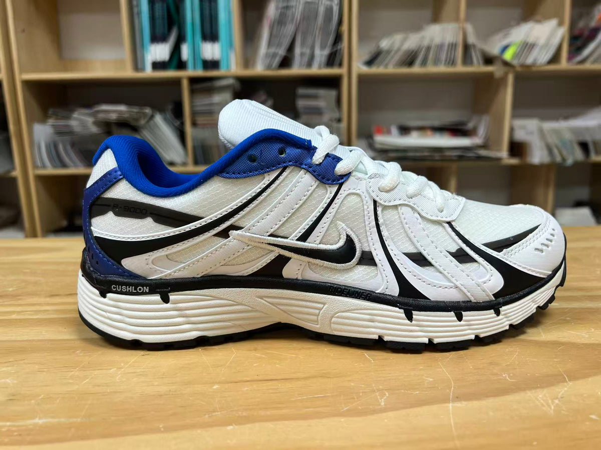 Nike P-6000 Sneakers in White Blue Black IZ4752-100 - product image from the listing.
