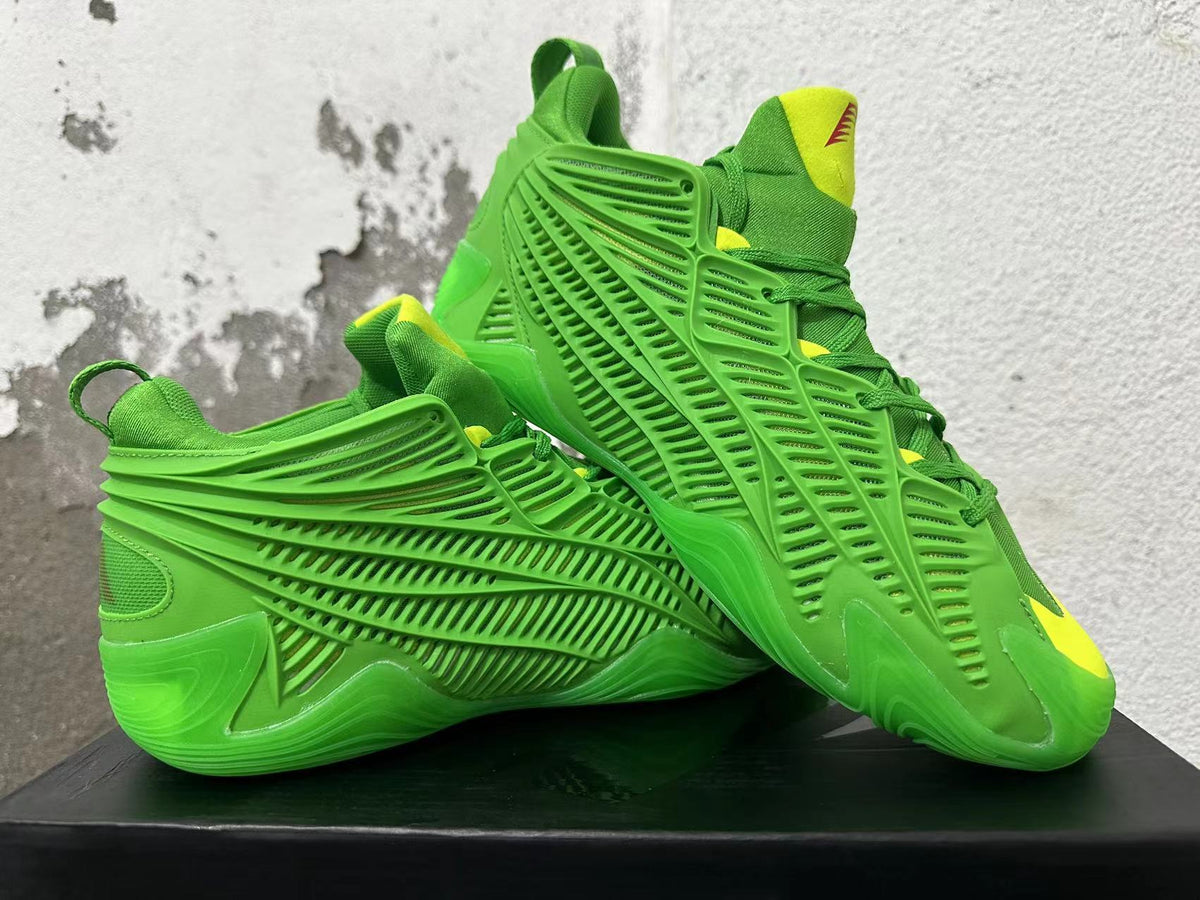 Adidas Green Basketball Trainers with Yellow Accents - product image from the listing.