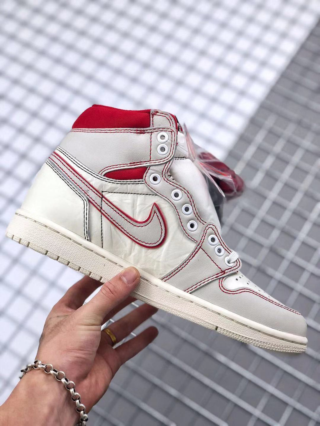 Air Jordan 1 Retro High OG Sneakers in White and Red - product image from the listing.