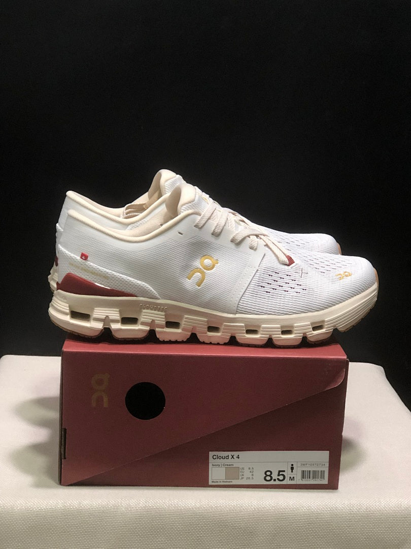 On Cloud X 4 Year of the Snake Sneakers in Ivory Cream - product image from the listing.