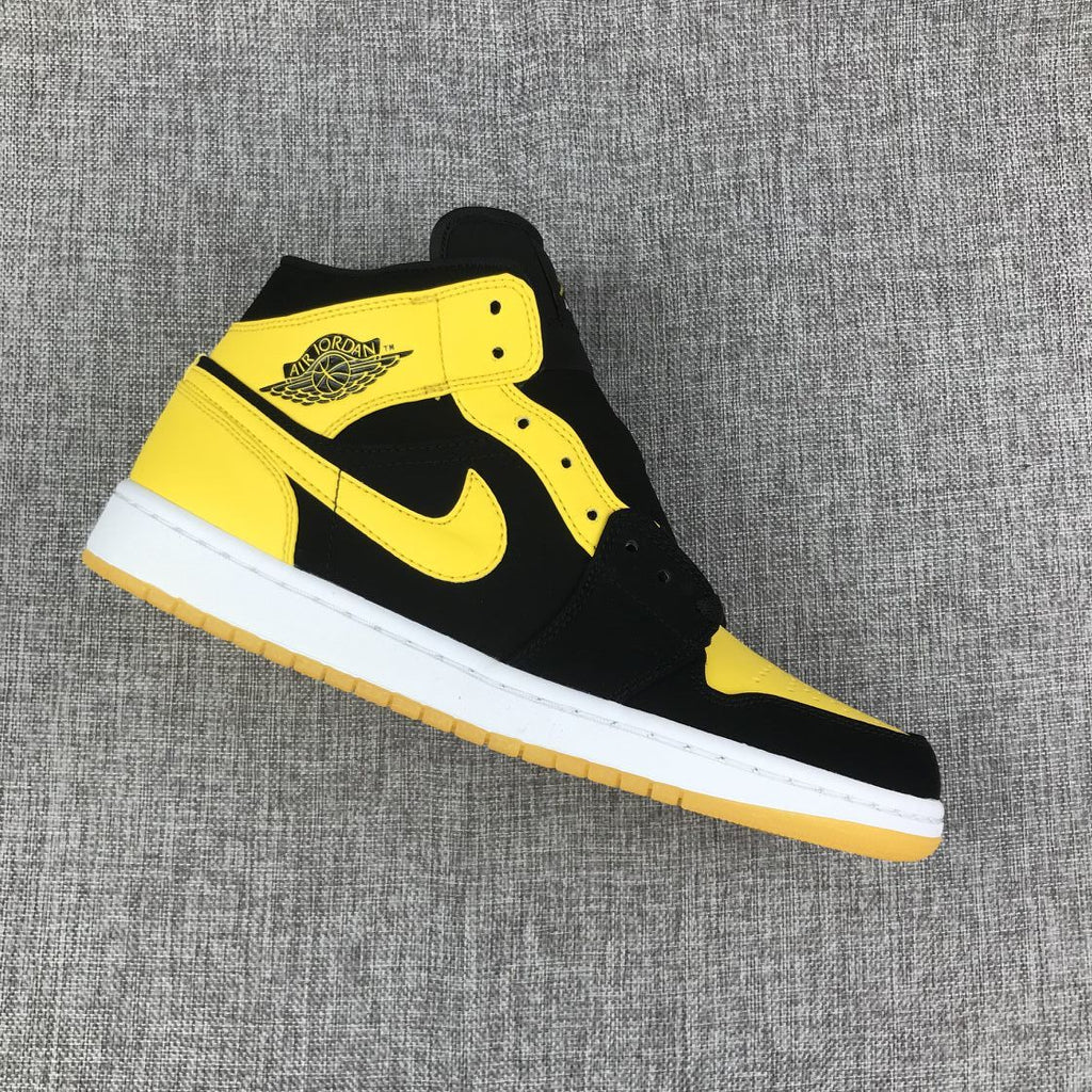 Air Jordan 1 Mid Sneakers in Black and Yellow - product image from the listing.