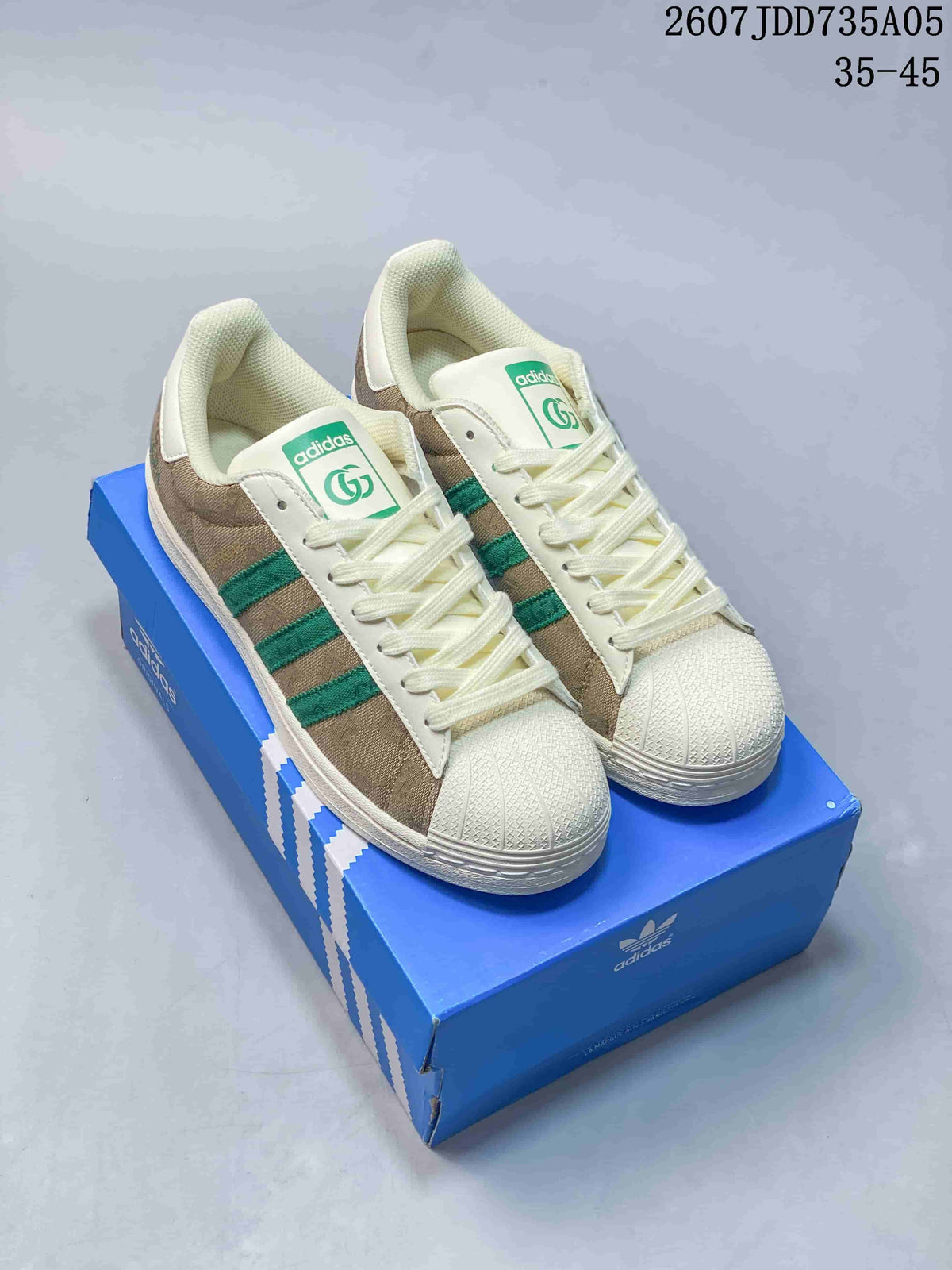 adidas Superstar Trainers Beige Green Shell-Toe Style 2607JDD735A05 - product image from the listing.