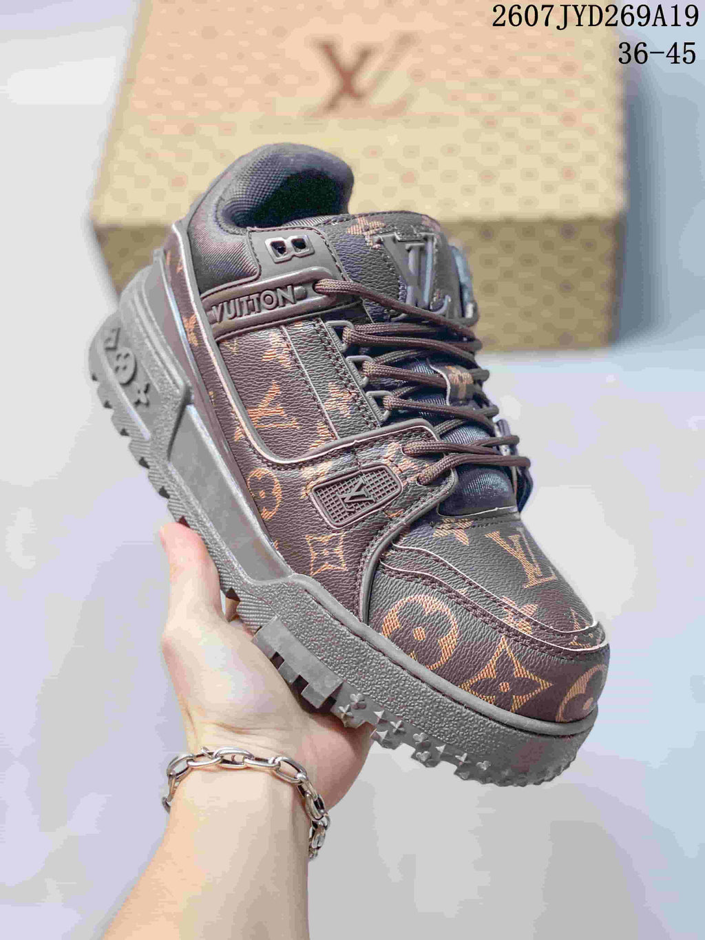 Louis Vuitton Trainer Maxi Low-Top Sneakers in Brown - product image from the listing.