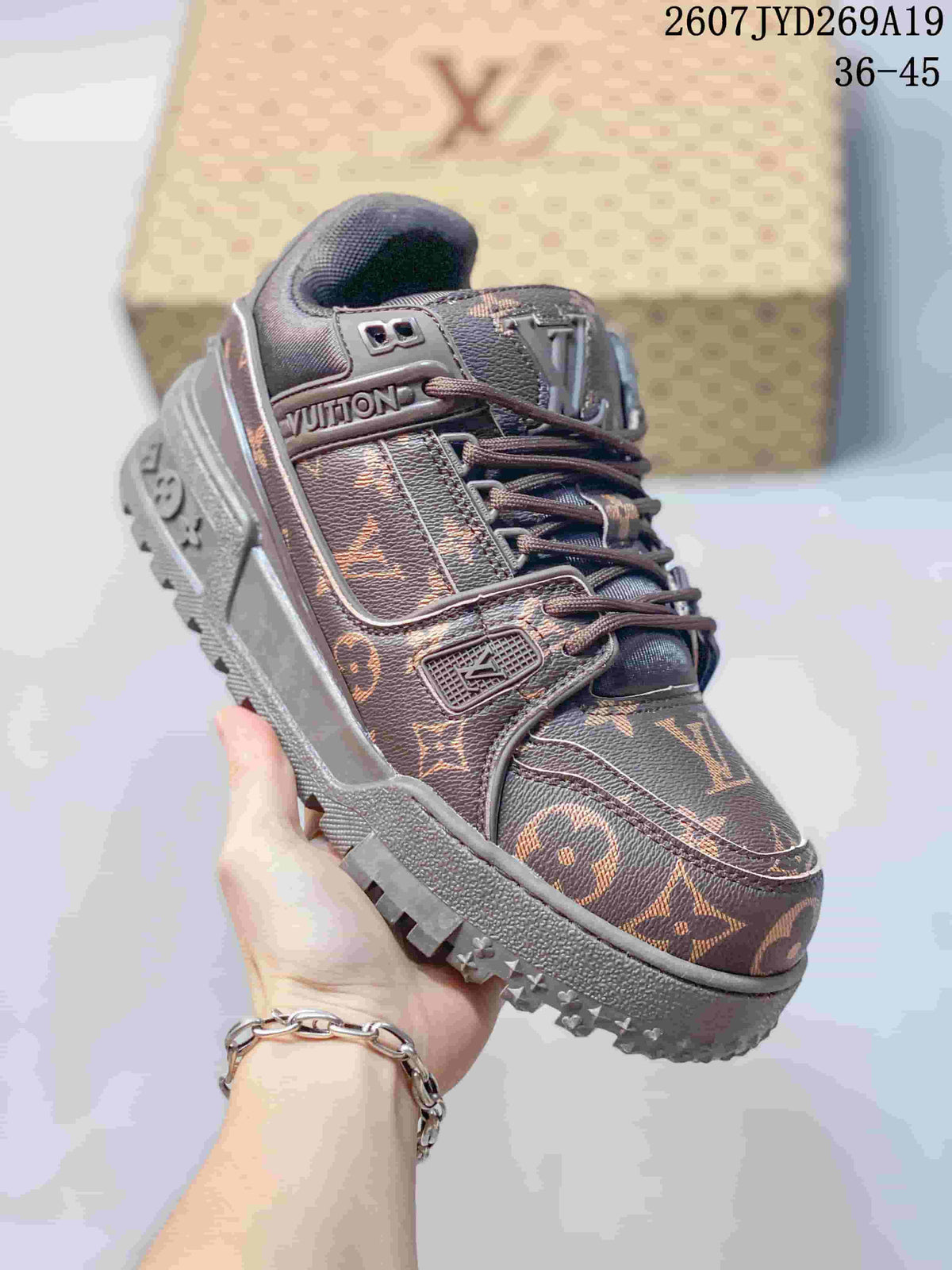 Louis Vuitton Trainer Maxi Low-Top Sneakers in Brown - product image from the listing.