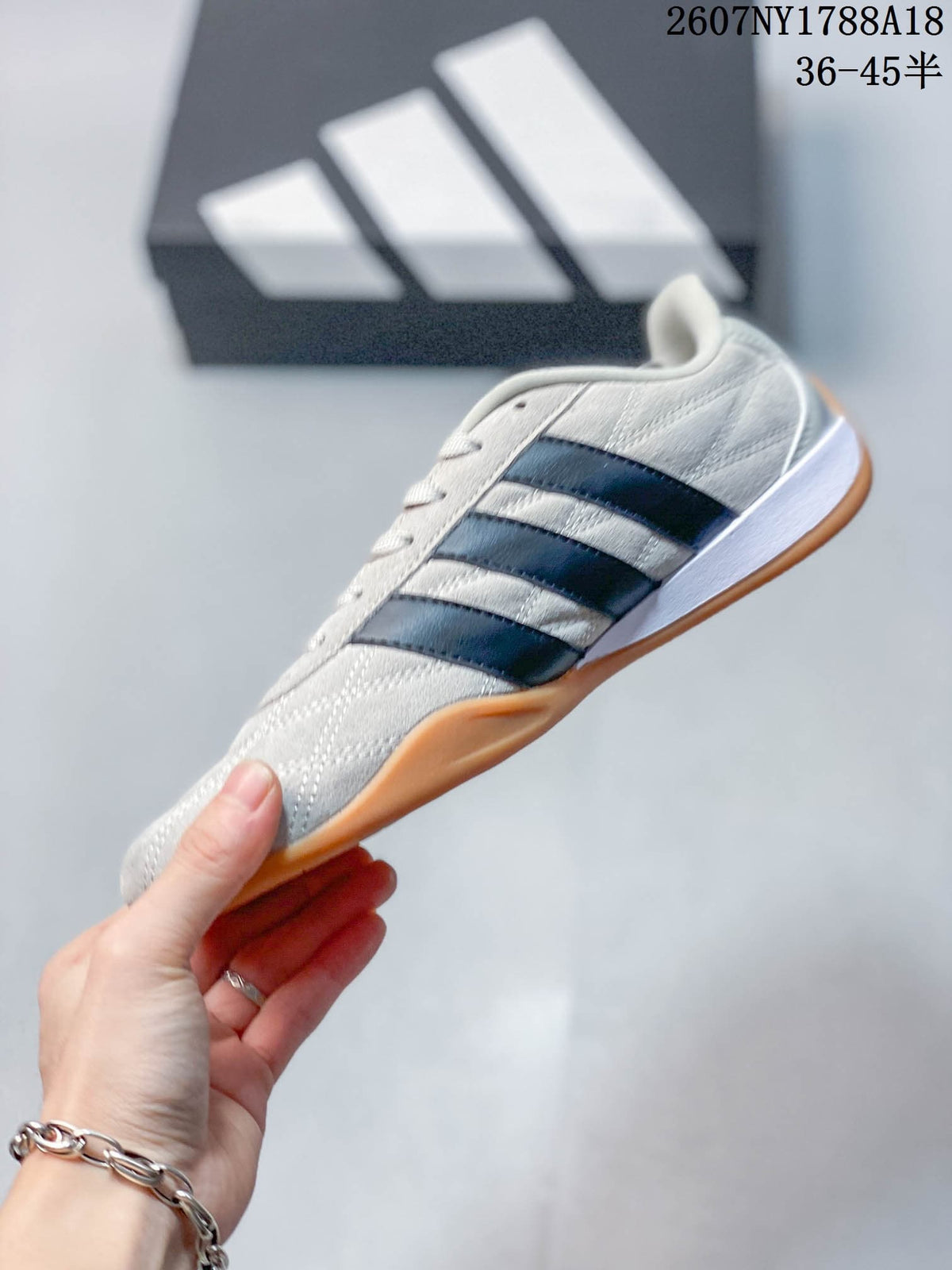 adidas Adipista Trainers in White Navy Gum EG8662 - product image from the listing.